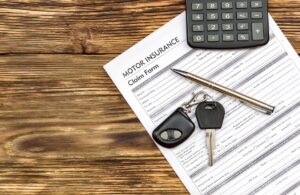 Car insurance policy documents and keys for a leased vehicle in Feasterville-Trevose