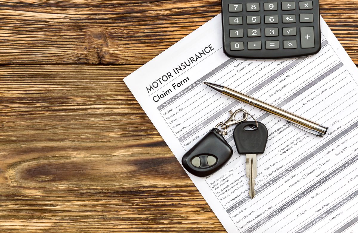 Car insurance policy documents and keys for a leased vehicle in Feasterville-Trevose